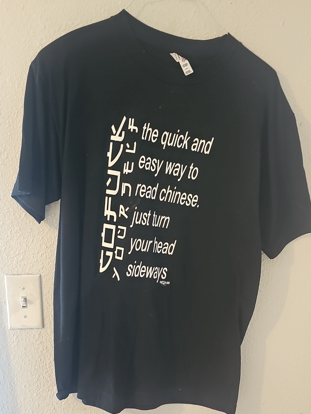 Unisex Black Graphic Tee with White Text $6
